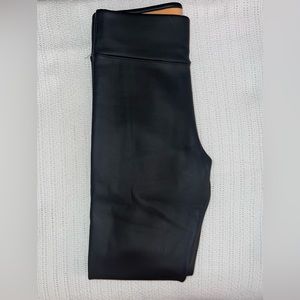 Black leather pants, women with faux fur inside